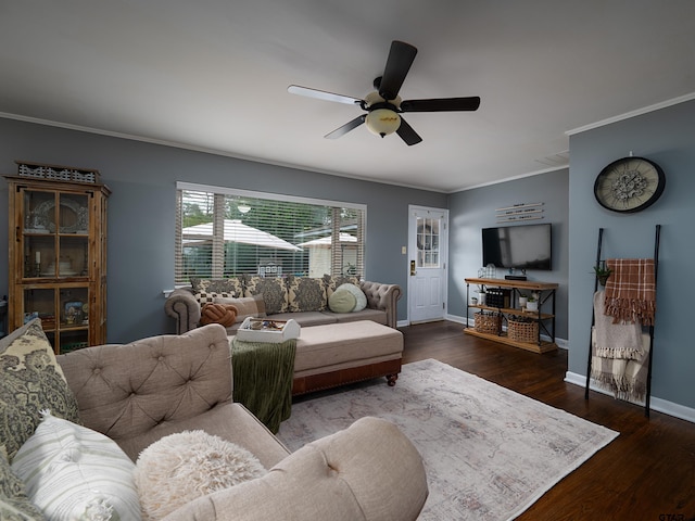 living room featuring crown molding, dark hardwood / wood-style floors, and ceiling fan