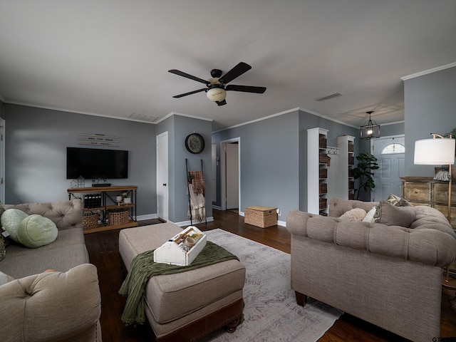 living room featuring ornamental molding, dark hardwood / wood-style floors, and ceiling fan