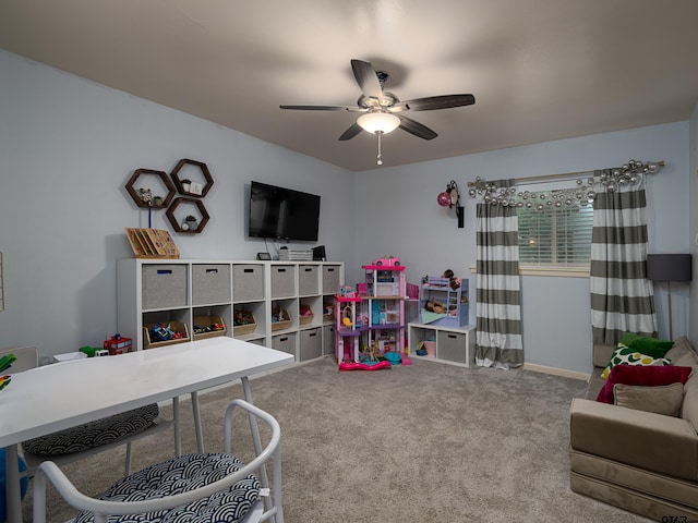 game room featuring carpet floors and ceiling fan