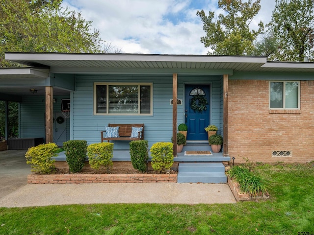 view of front facade featuring covered porch