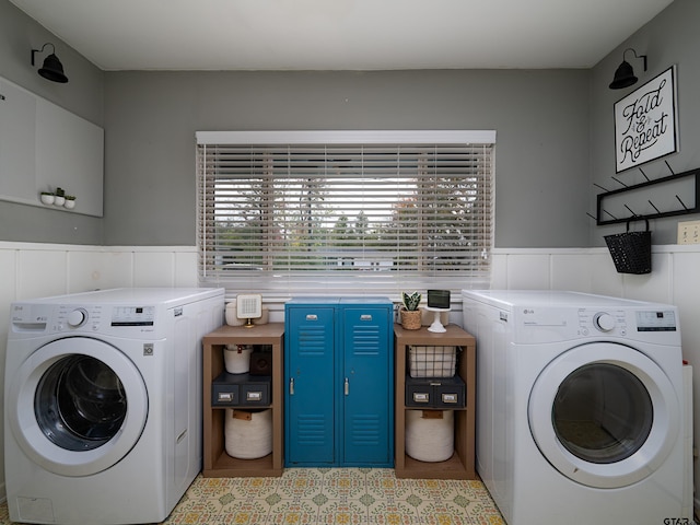 clothes washing area with independent washer and dryer