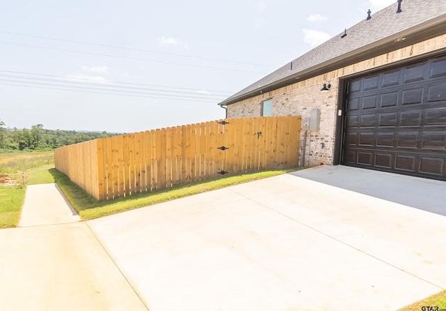 view of patio featuring a garage