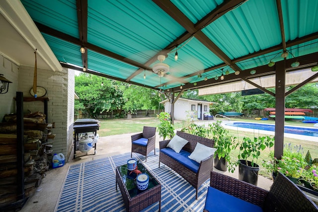 17550 Kristopher Cir, Whitehouse, TX 75791 - fenced backyard with a grill, an outbuilding, and a patio area