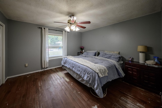 17550 Kristopher Cir, Whitehouse, TX 75791 - bedroom featuring wood finished floors, a textured ceiling, and ceiling fan