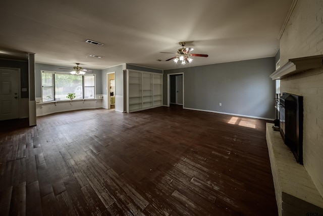 17550 Kristopher Cir, Whitehouse, TX 75791 - unfurnished living room with a ceiling fan, dark wood finished floors, and a fireplace