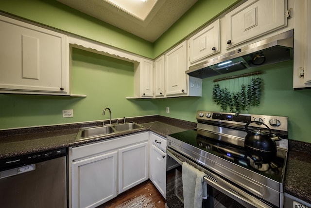 17550 Kristopher Cir, Whitehouse, TX 75791 - kitchen featuring appliances with stainless steel finishes, under cabinet range hood, white cabinetry, and dark wood-style floors