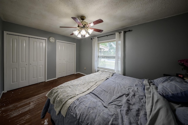 17550 Kristopher Cir, Whitehouse, TX 75791 - bedroom featuring multiple closets, a textured ceiling, wood finished floors, and ceiling fan