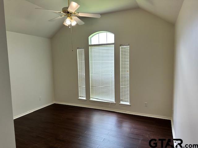 1712 Onyx Cv, Whitehouse, TX 75791 - spare room featuring vaulted ceiling, a ceiling fan, and wood finished floors