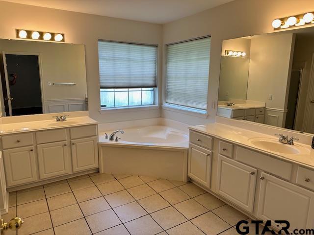 1712 Onyx Cv, Whitehouse, TX 75791 - full bath featuring tile patterned flooring, a bath, and two vanities