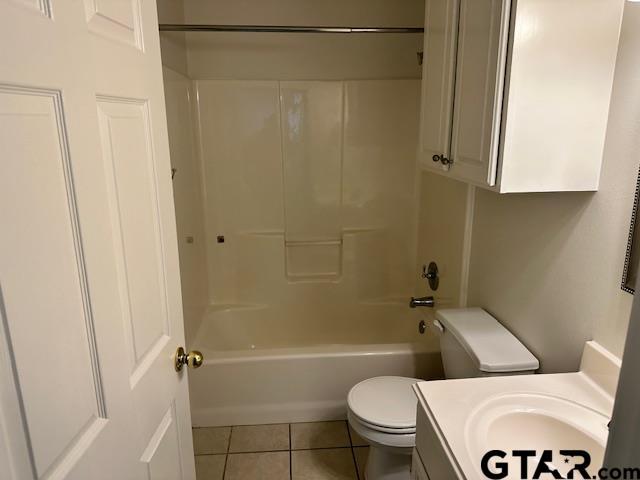 1712 Onyx Cv, Whitehouse, TX 75791 - bathroom with tile patterned floors, vanity, and tub / shower combination