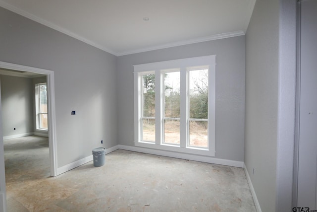 unfurnished room with ornamental molding