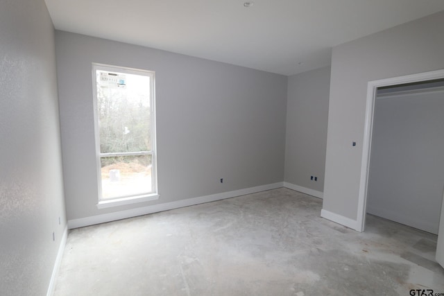 unfurnished bedroom featuring a closet