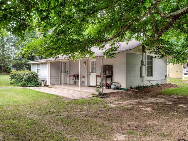 14900 Fm 848, Whitehouse, TX 75791 - back of property featuring a yard, a patio area, and a shingled roof