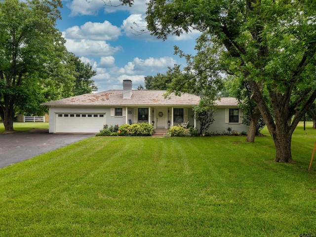 14900 Fm 848, Whitehouse, TX 75791 - ranch-style house with driveway, a garage, a front lawn, and a chimney