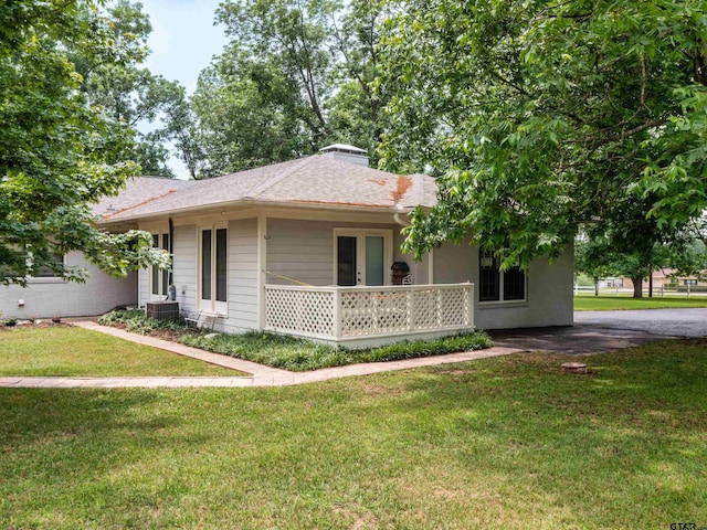 14900 Fm 848, Whitehouse, TX 75791 - view of front facade featuring a front yard, a shingled roof, and covered porch