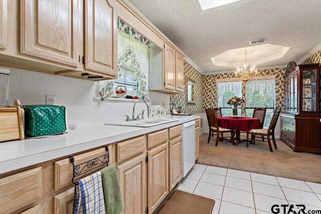 kitchen with light carpet, light countertops, visible vents, white dishwasher, and light brown cabinets