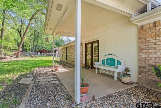 view of patio featuring fence