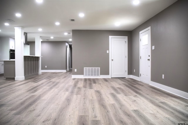 613 Northgate Rd, Hideaway, TX 75771 - unfurnished living room featuring light wood-type flooring, visible vents, baseboards, and recessed lighting