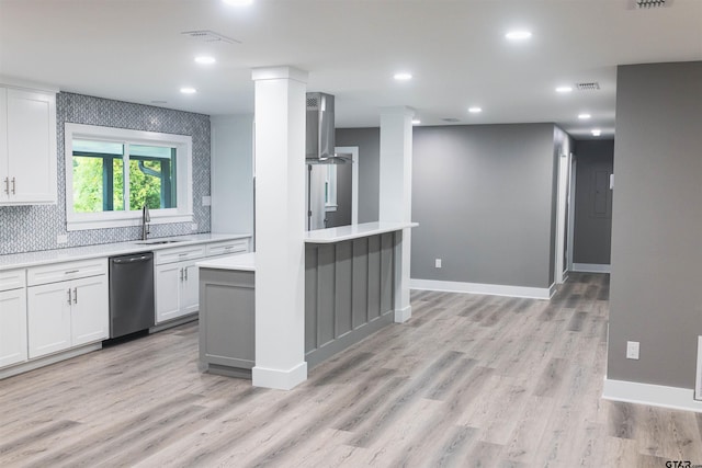 613 Northgate Rd, Hideaway, TX 75771 - kitchen featuring light wood-style flooring, dishwasher, a sink, white cabinetry, and light countertops