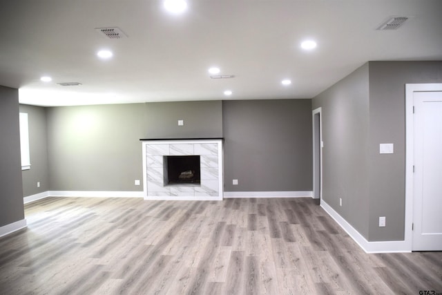 613 Northgate Rd, Hideaway, TX 75771 - unfurnished living room featuring wood finished floors, baseboards, visible vents, and recessed lighting