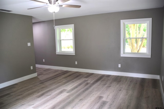 613 Northgate Rd, Hideaway, TX 75771 - spare room featuring baseboards, ceiling fan, visible vents, and wood finished floors