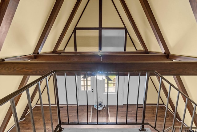 stairs featuring hardwood / wood-style flooring