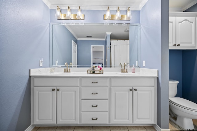 4918 Pine Knl, Tyler, TX 75703 - full bathroom featuring double vanity, toilet, ornamental molding, baseboards, and tile patterned floors