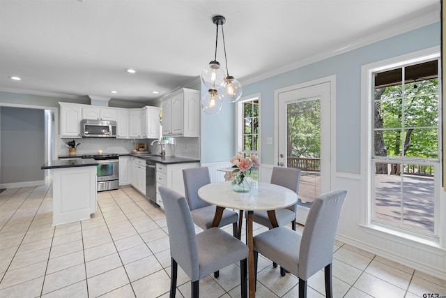 4918 Pine Knl, Tyler, TX 75703 - dining room featuring light tile patterned floors, plenty of natural light, ornamental molding, and recessed lighting