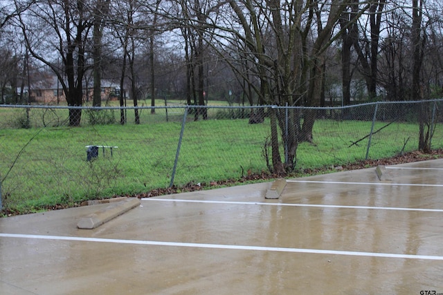 exterior space featuring a yard and fence