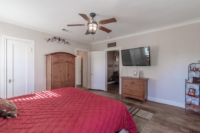 bedroom featuring crown molding, visible vents, and dark wood-type flooring