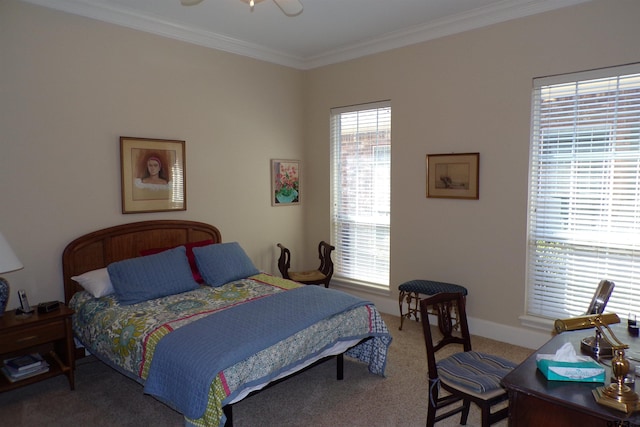 bedroom with ceiling fan, carpet, and ornamental molding