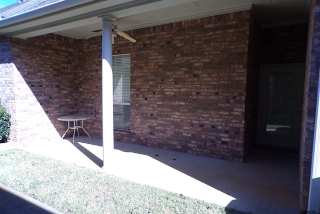 view of patio featuring ceiling fan