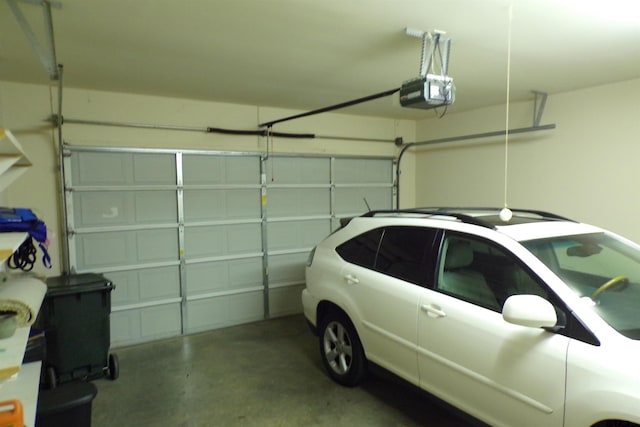 garage featuring a garage door opener