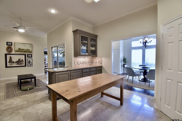 1406 Kingspark Dr, Tyler, TX 75703 - kitchen featuring crown molding, backsplash, glass insert cabinets, gray cabinets, and a chandelier