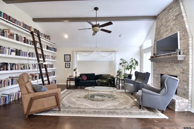 1406 Kingspark Dr, Tyler, TX 75703 - living room with ceiling fan, a fireplace, beamed ceiling, wood finished floors, and high vaulted ceiling