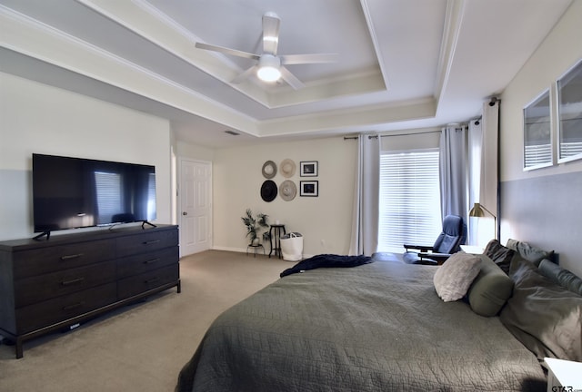 1406 Kingspark Dr, Tyler, TX 75703 - bedroom with light colored carpet, a tray ceiling, and ceiling fan