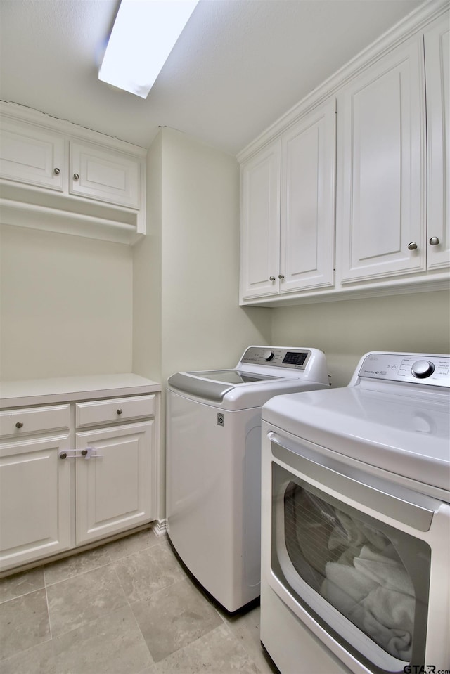1406 Kingspark Dr, Tyler, TX 75703 - laundry area featuring washing machine and clothes dryer and cabinet space