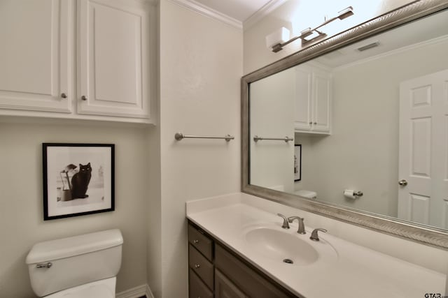 1406 Kingspark Dr, Tyler, TX 75703 - bathroom featuring toilet, vanity, and ornamental molding