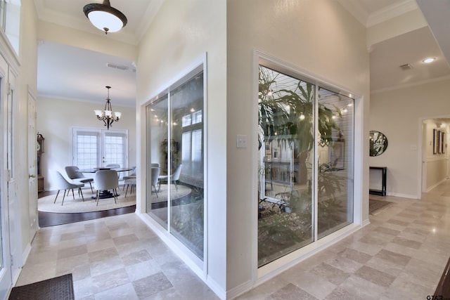 1406 Kingspark Dr, Tyler, TX 75703 - entryway with crown molding, a chandelier, baseboards, and a towering ceiling