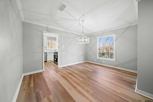 unfurnished dining area featuring light wood-type flooring and crown molding