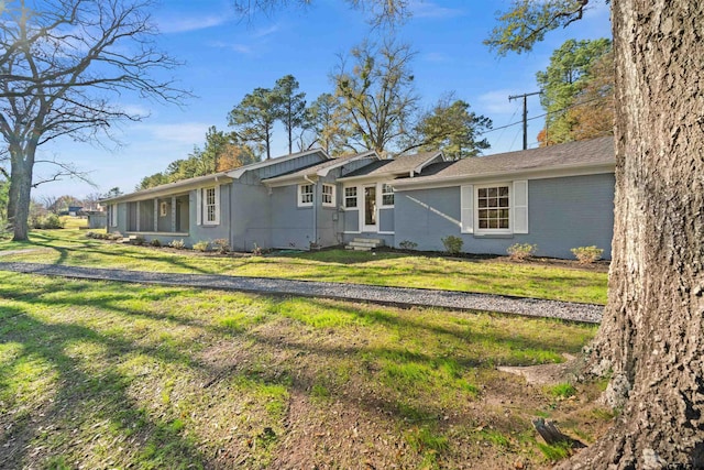 exterior space featuring a front lawn