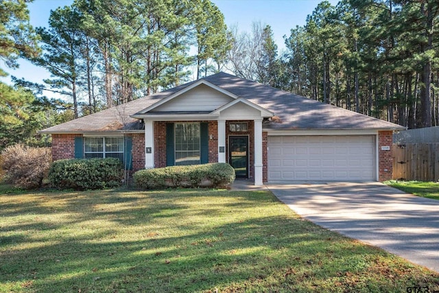 ranch-style home with a garage and a front lawn