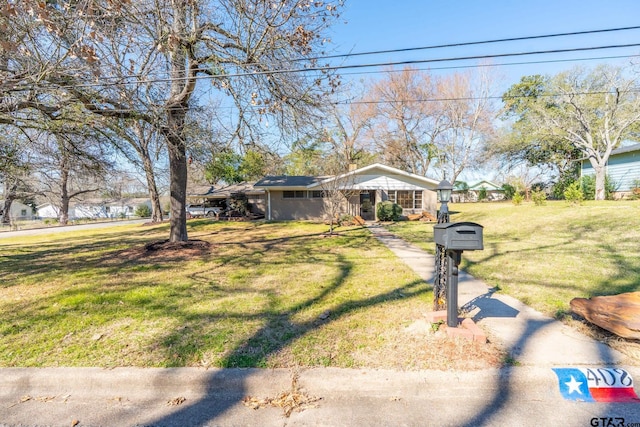 bungalow featuring a chimney and a front yard