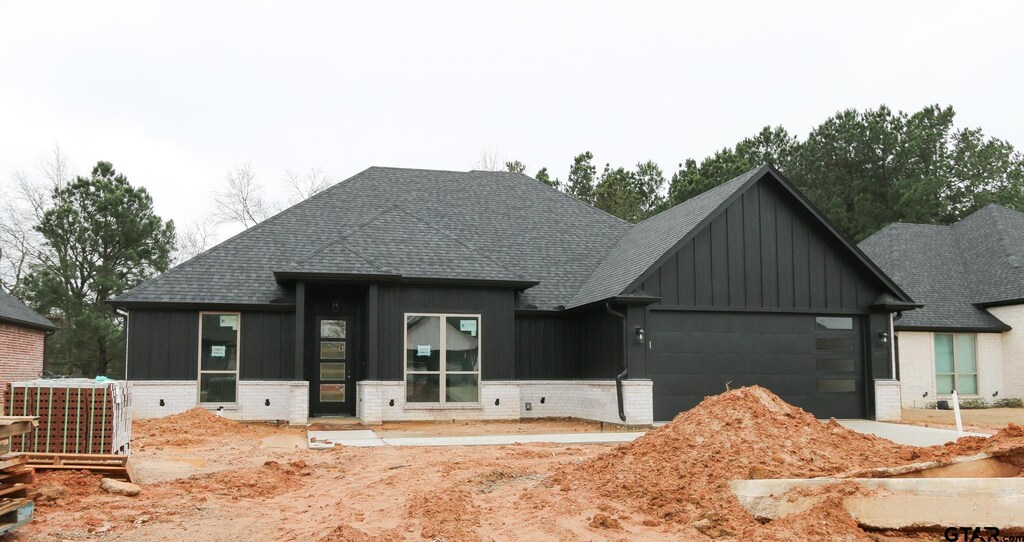 view of front of house with cooling unit