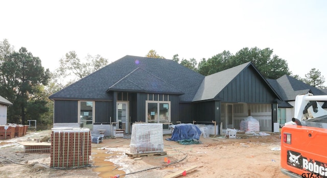 view of front of house with cooling unit