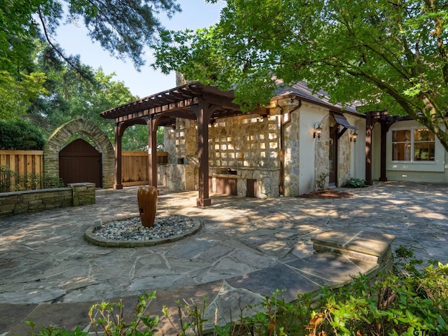 view of patio featuring a pergola