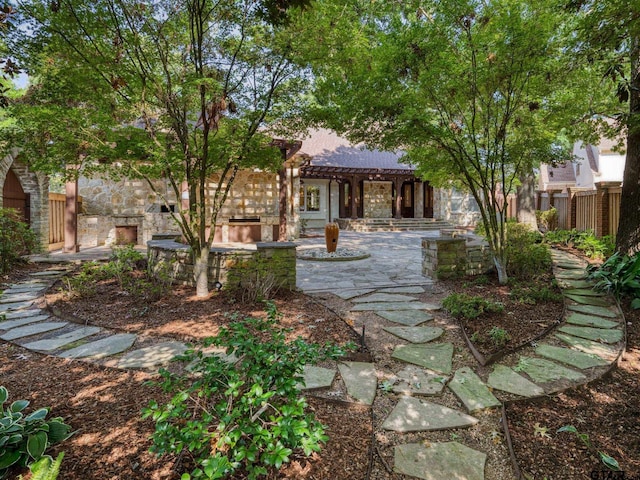 exterior space featuring a pergola and a patio