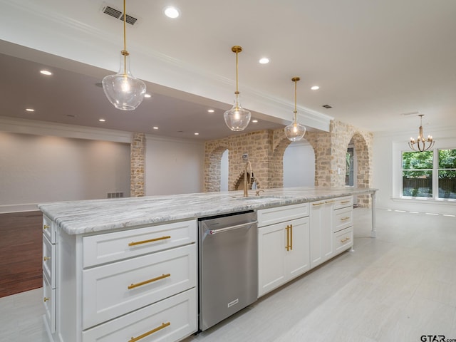 kitchen with white cabinetry, dishwasher, hanging light fixtures, ornamental molding, and a large island with sink