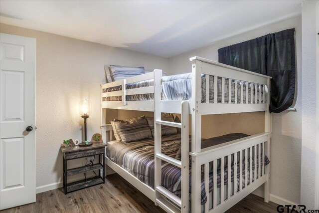 194 Debra Dr, Bullard, TX 75757 - bedroom featuring baseboards and wood finished floors