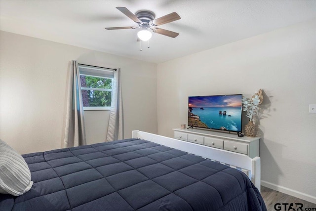 194 Debra Dr, Bullard, TX 75757 - bedroom featuring wood finished floors, baseboards, and ceiling fan